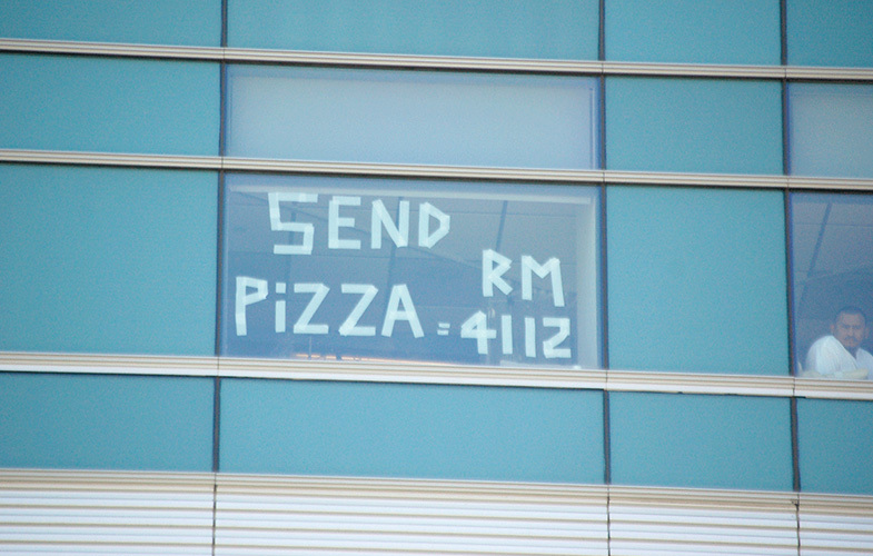 Send Pizza sign in window