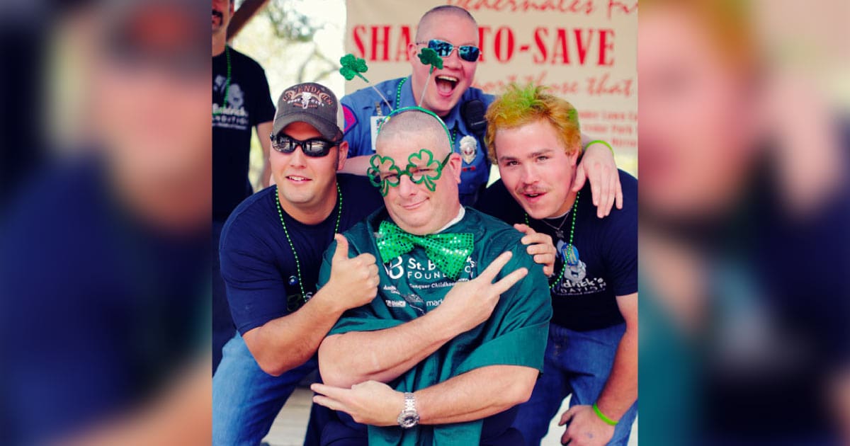 shavees pose while wearing St. Patrick's Day glasses