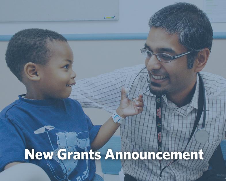 Dr and child patient with New Grants Announcement title