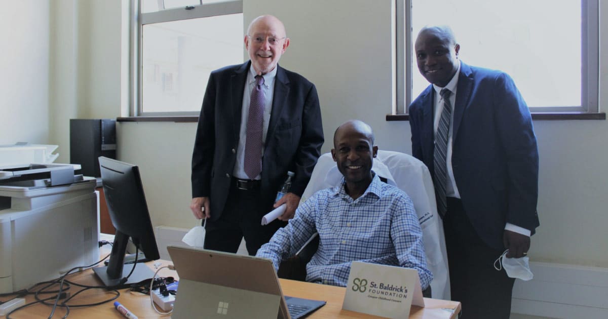 Dr. Fred Lutwama, current St. Baldrick’s International Scholar (center) with Dr. David Poplack (left), and Dr. Joseph Lubega (right)