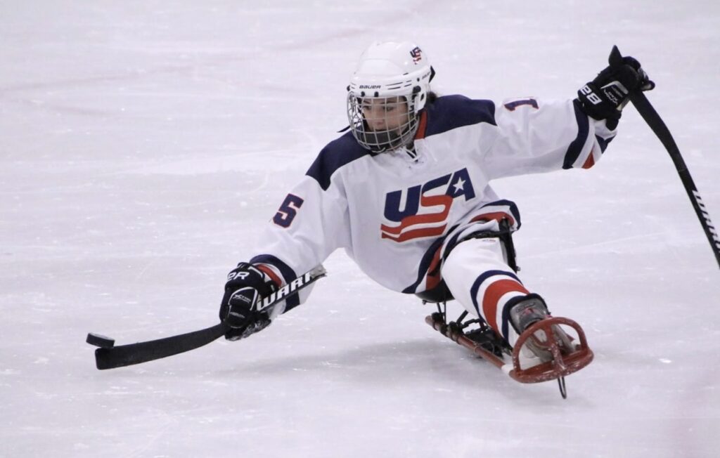 Hanna playing sled hockey for Team USA