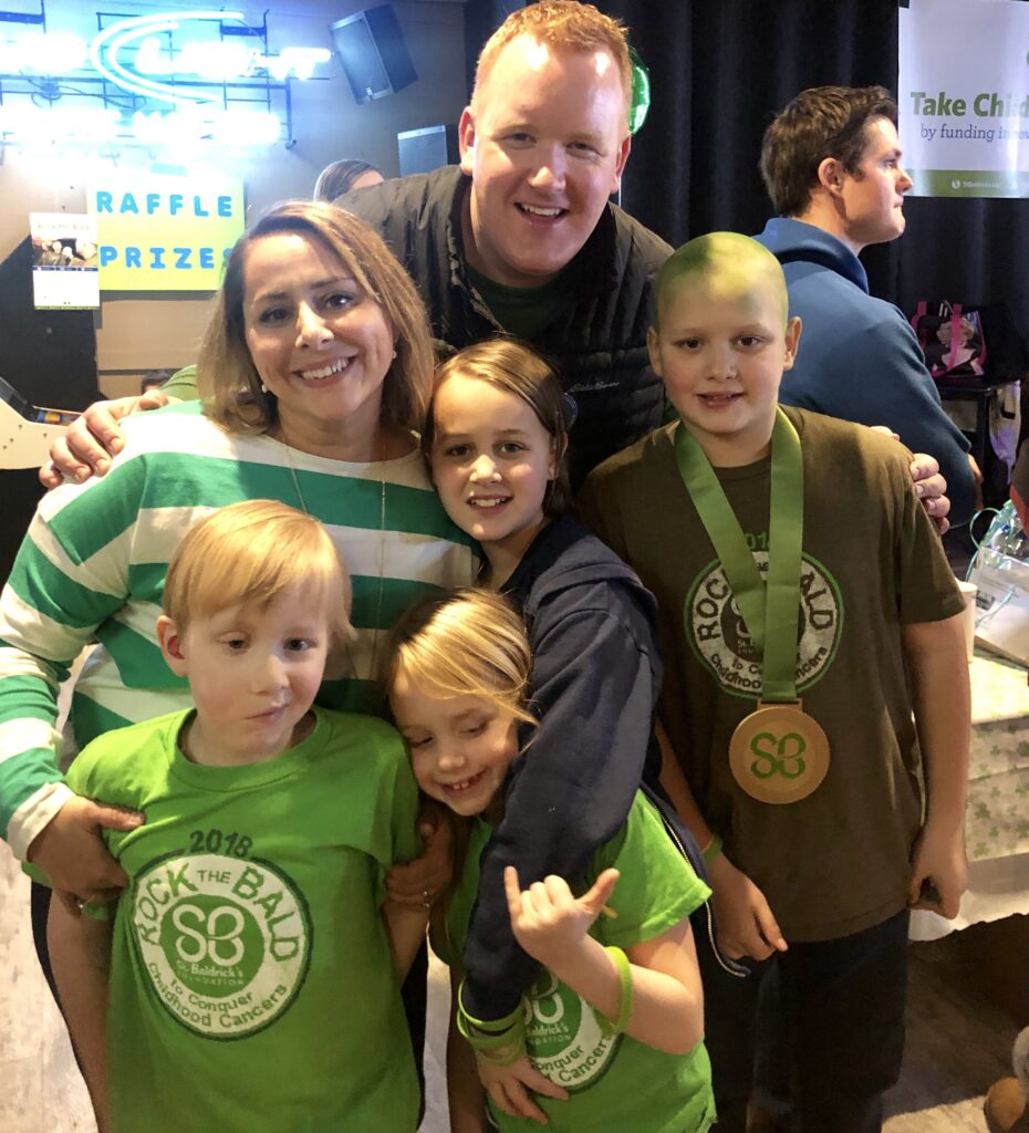 Jonah & family at a St. Baldrick’s event where his brother, Noah, was the top shavee.