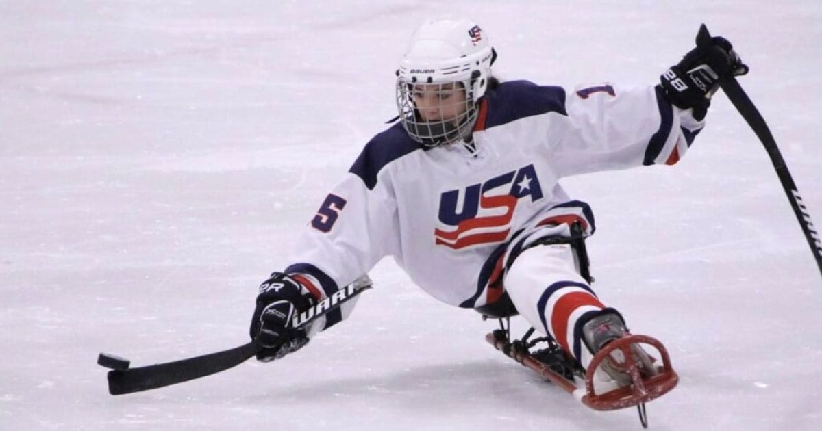 Hanna playing sled hockey for Team USA