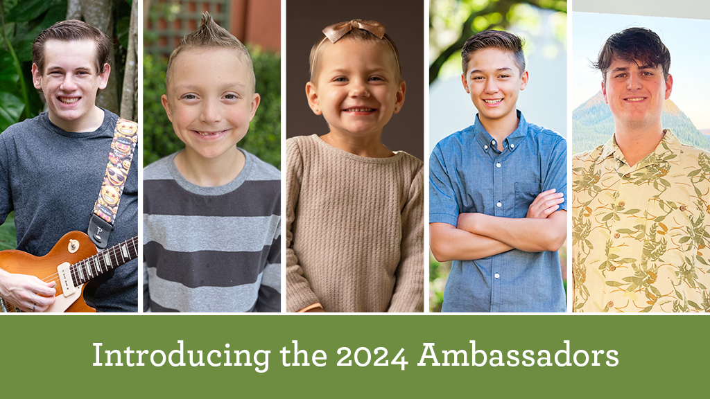 2024 Ambassadors left to right: Aaron holding a guitar wearing a grey shirt, Camden wearing a striped light and dark grey shirt, Julianna with a pink bow on her head wearing a beige sweater, Scott wearing a blue button down, Sam wearing a button down with leaves on it.