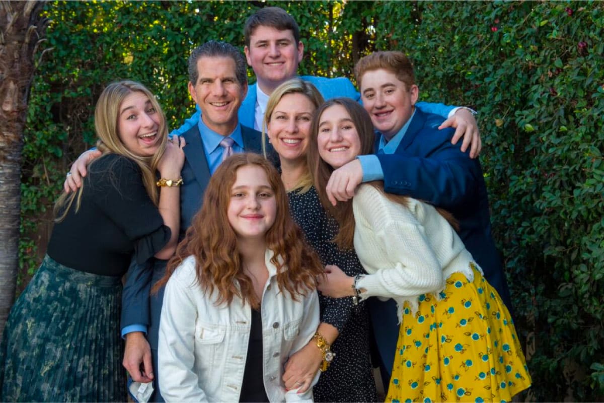 Sam and family photo