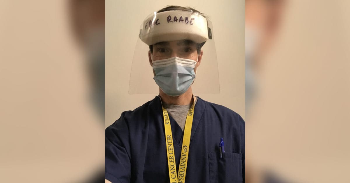 Dr. Eric Raabe wearing mask and visor