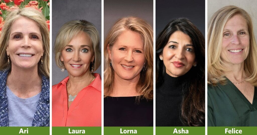 Six women with bright smiles, showcasing a sense of unity and happiness.