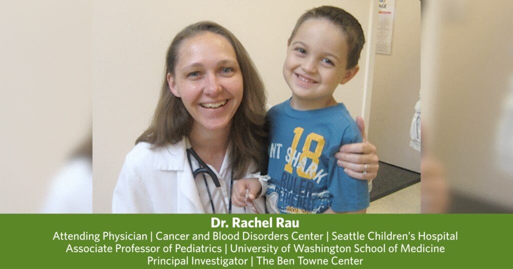 Dr. Rachel Rau interacts with a young patient, showcasing a friendly and caring approach in her practice.