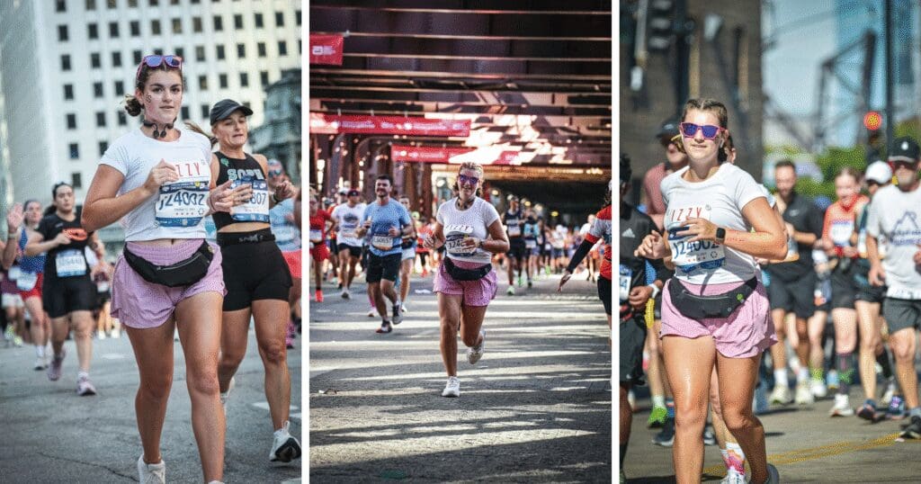 A runner in a white shirt and pink shorts participates in a city marathon. The scene is energetic, with a diverse crowd and urban backdrop.
